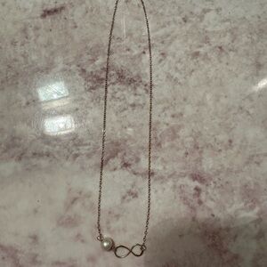 Elegant Gold Infinity Necklace with Pearl Accent